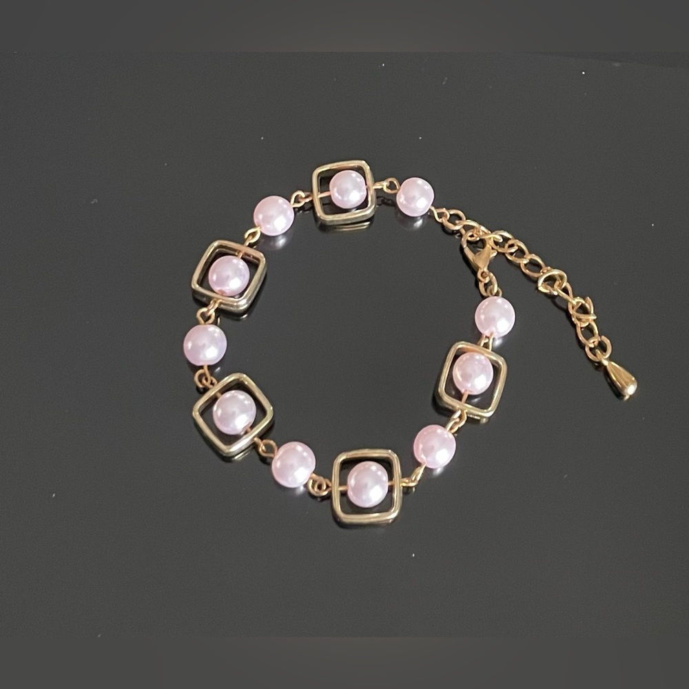 Elegant Gold and Pink Bracelet
